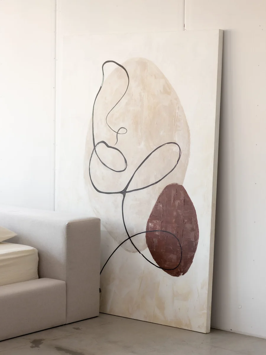 Minimal Line art panel in a warm, neutral Riyadh interior