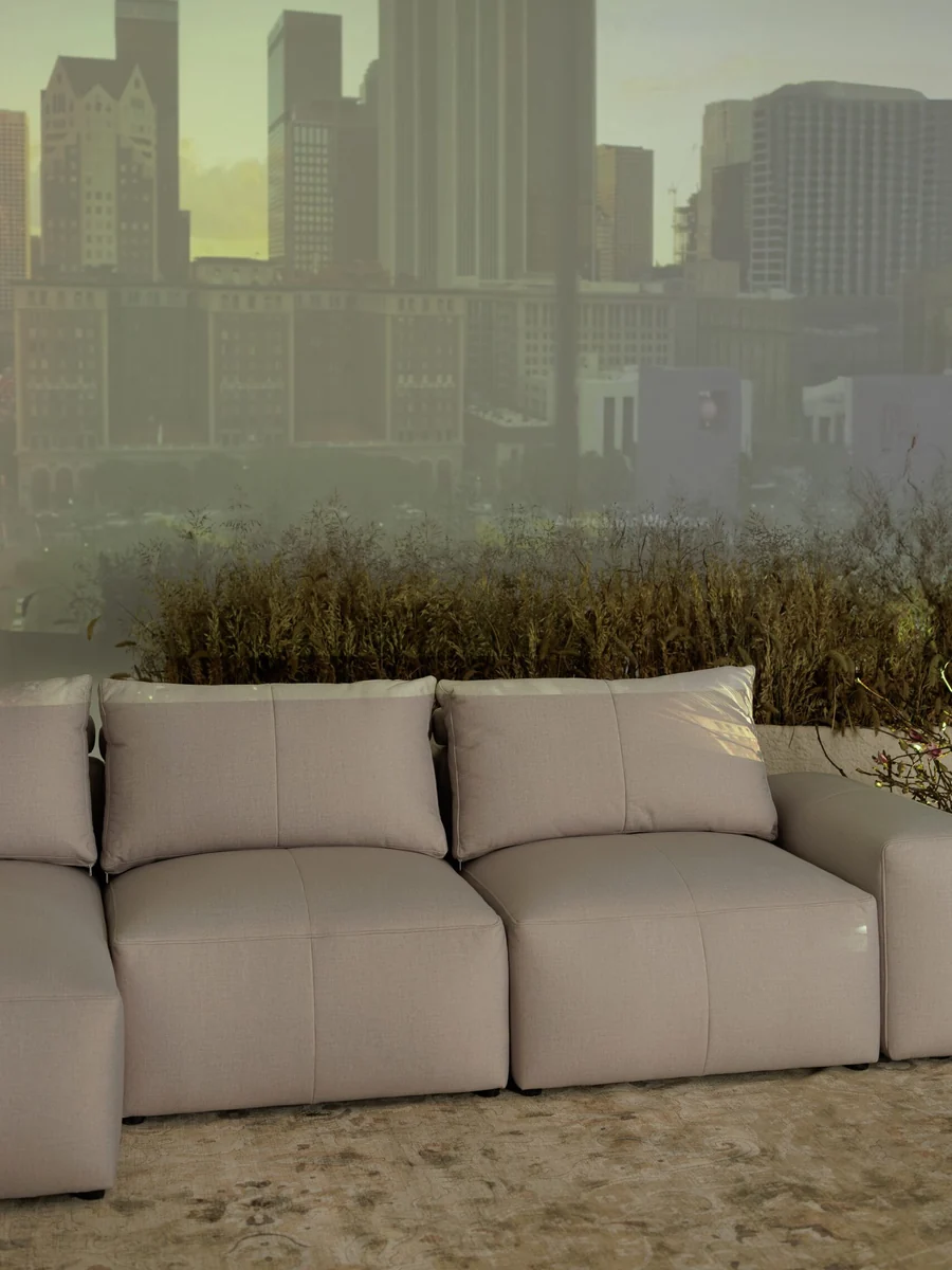 Amos A17 corner sofa in a warm, neutral Riyadh interior