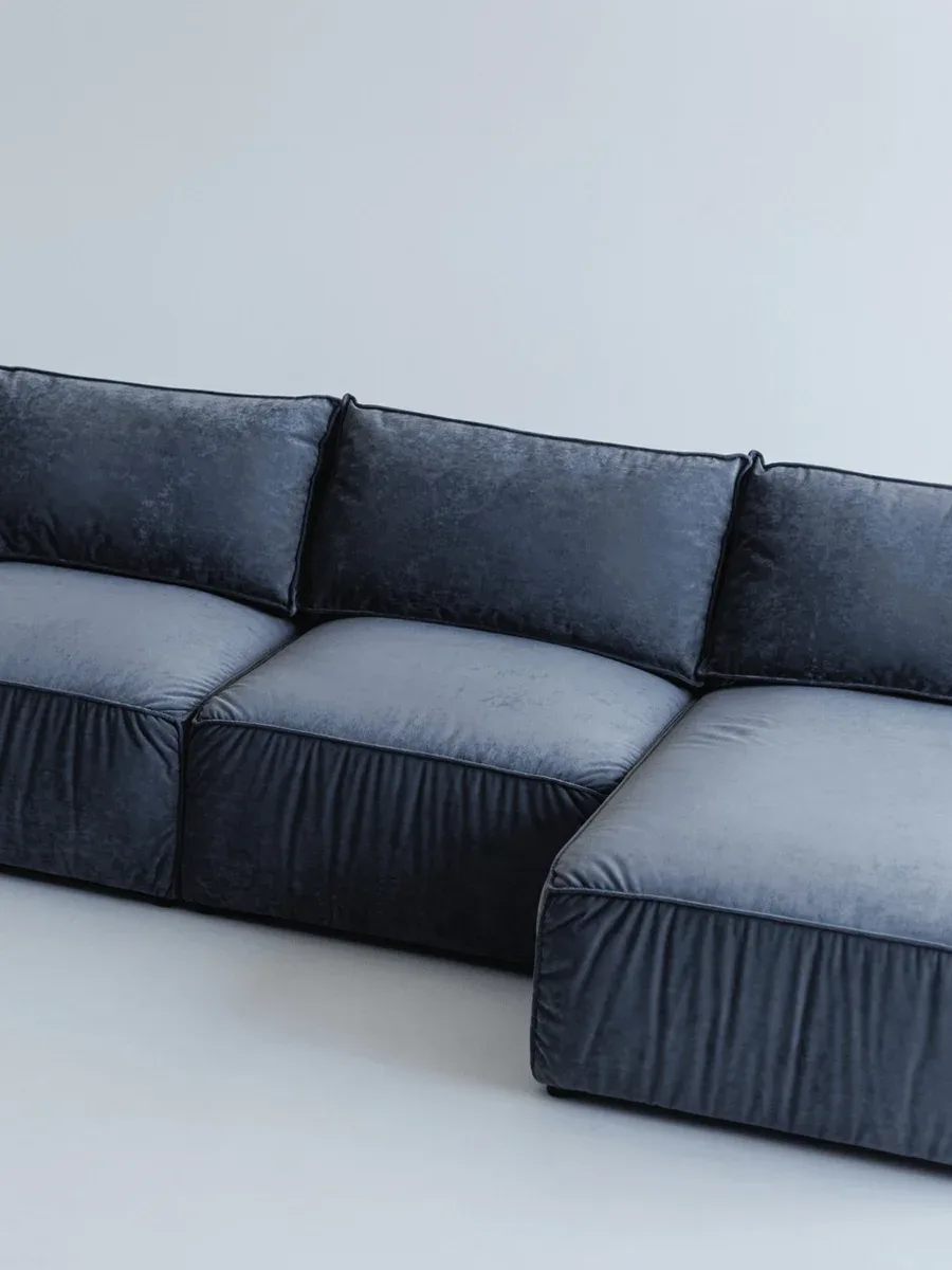 Close-up of Milano E1 fabric upholstery and stitching