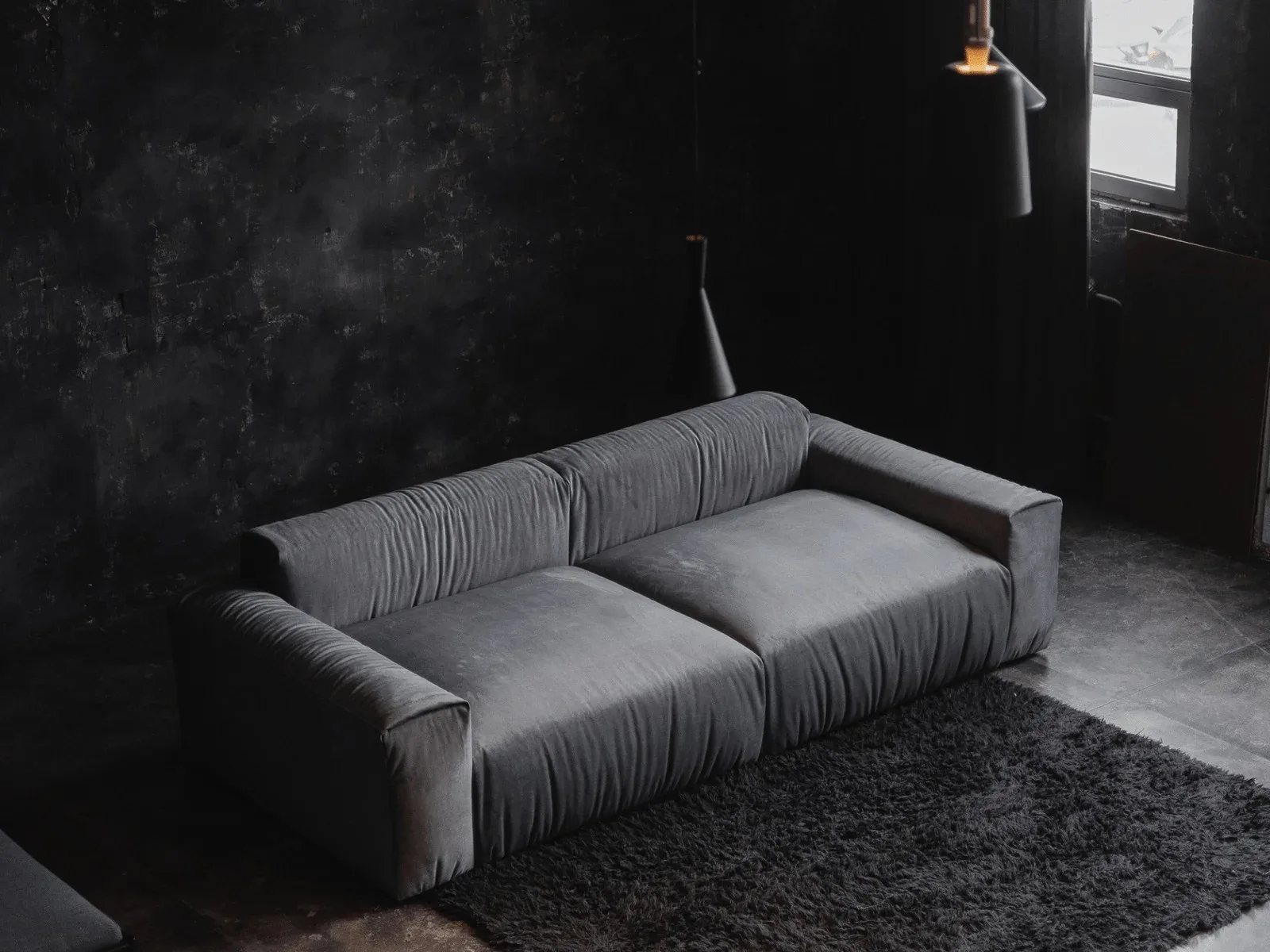 A Mille sofa upholstered in premium European fabric from an Italian mill