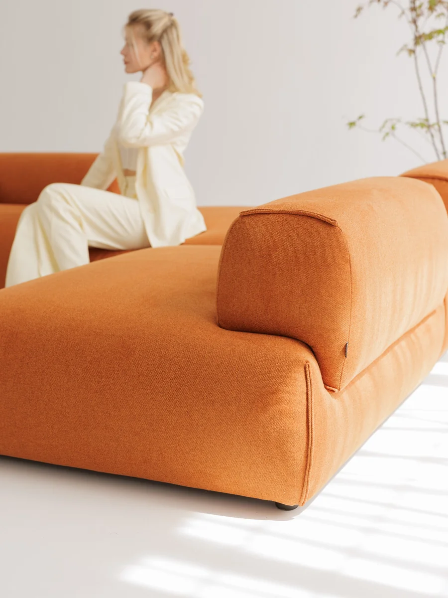 Close-up of Nissa N2 fabric upholstery and stitching